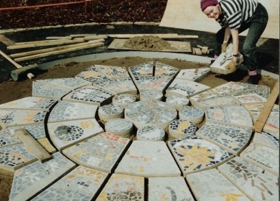 The mosaic sections were made by local people in workshops and cast into sections in the park pavillion.